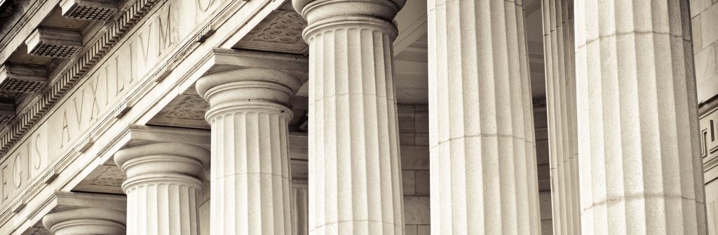 Pillars supporting a building.