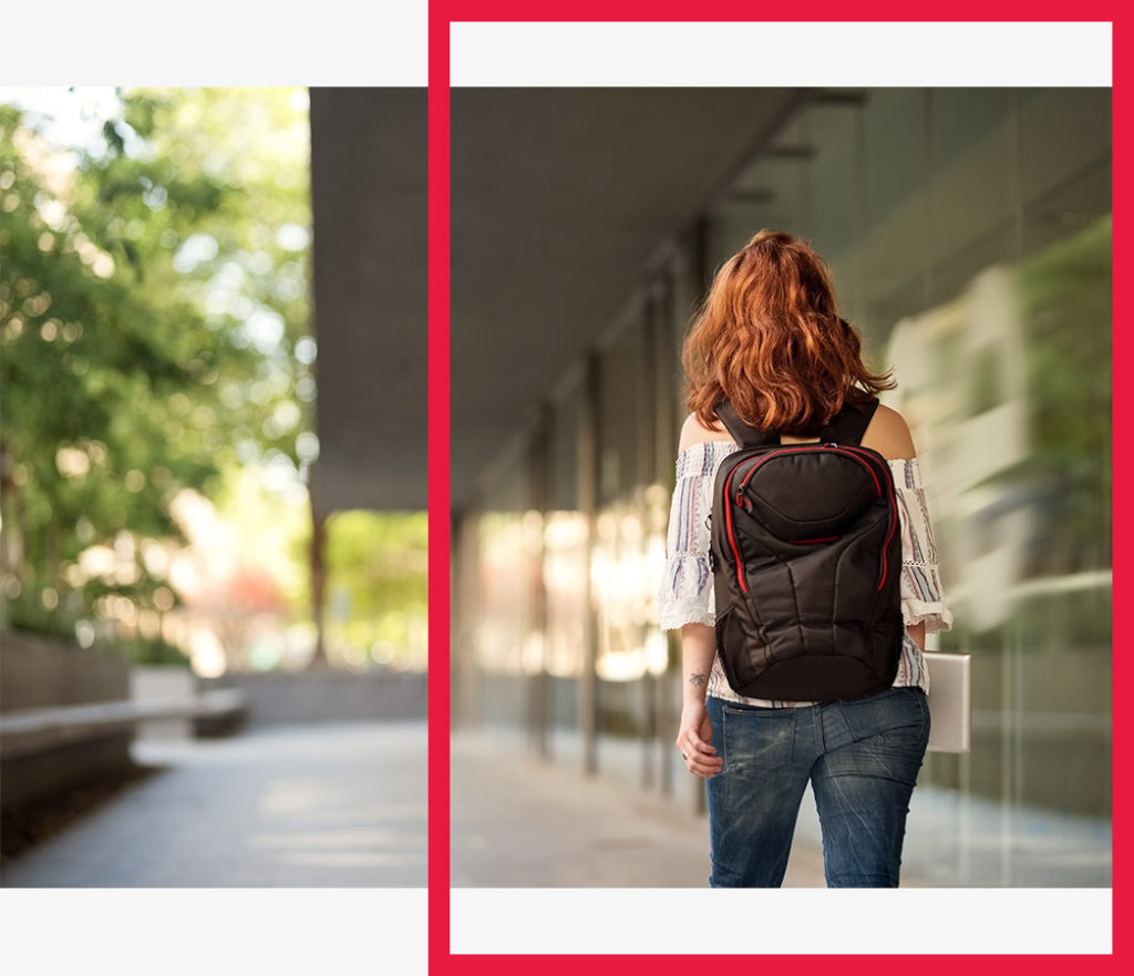 A student walks on campus.