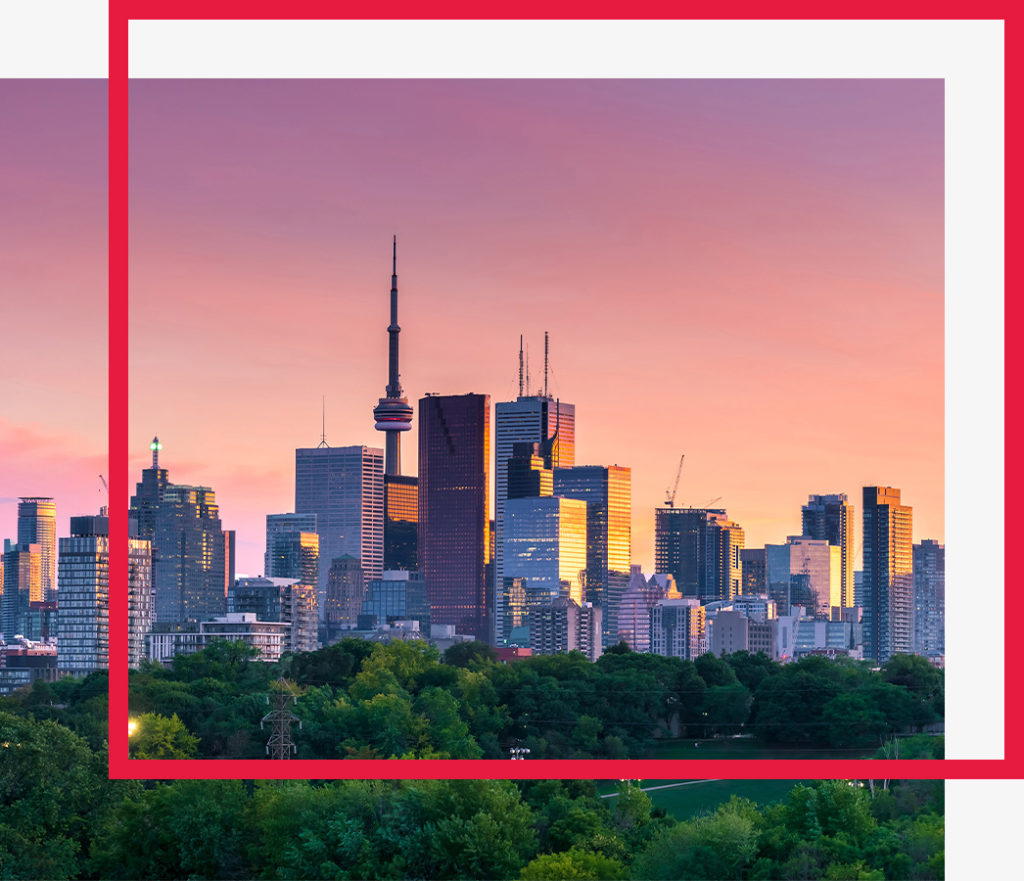 Toronto's city skyline at dusk.