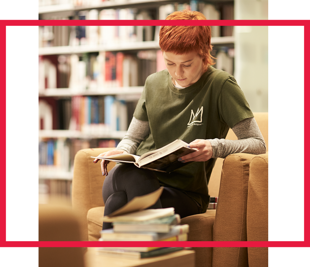A student reads in the library.