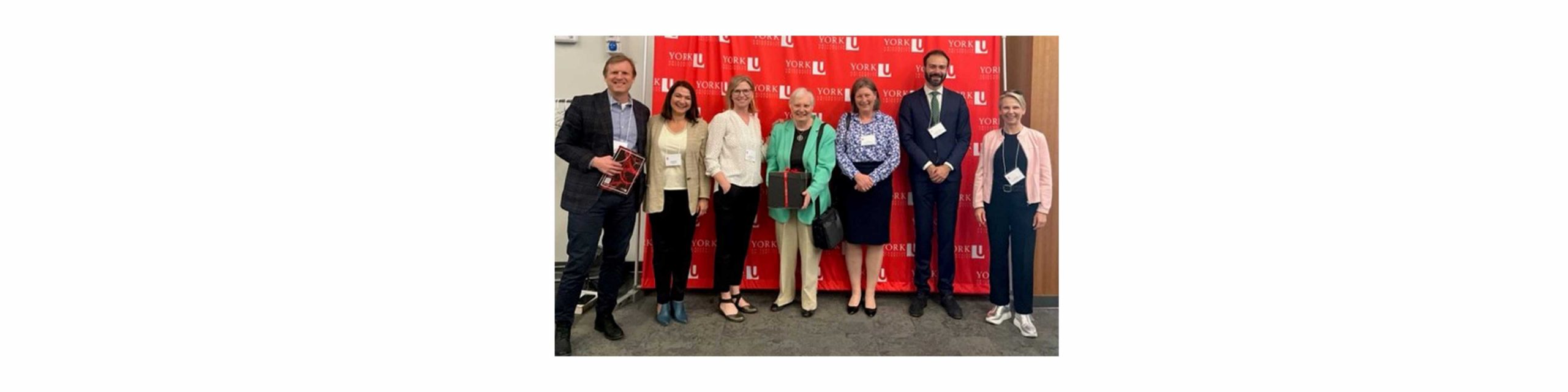 L to R: Trevor Farrow, Pina D'Agostino, Dayna Scott, Mary Jane Mossman, Mary Condon, Valerio De Stefano, Lisa Philipps