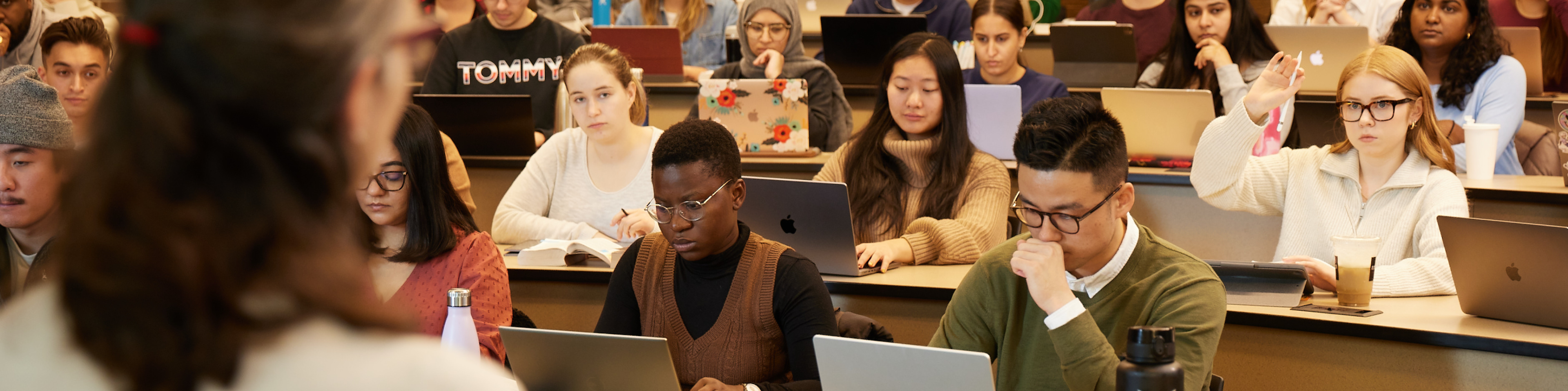 Photo of students listening to an Osgoode professor during a lecture.