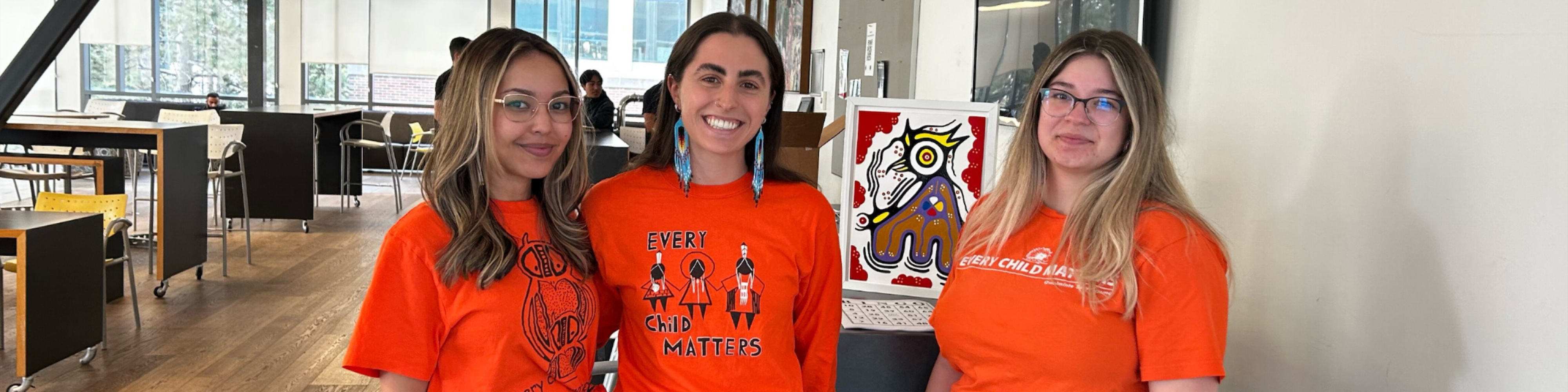 Three Osgoode Indigenous Students' Association Leaders in orange t-shirts for Orange Shirt Day.