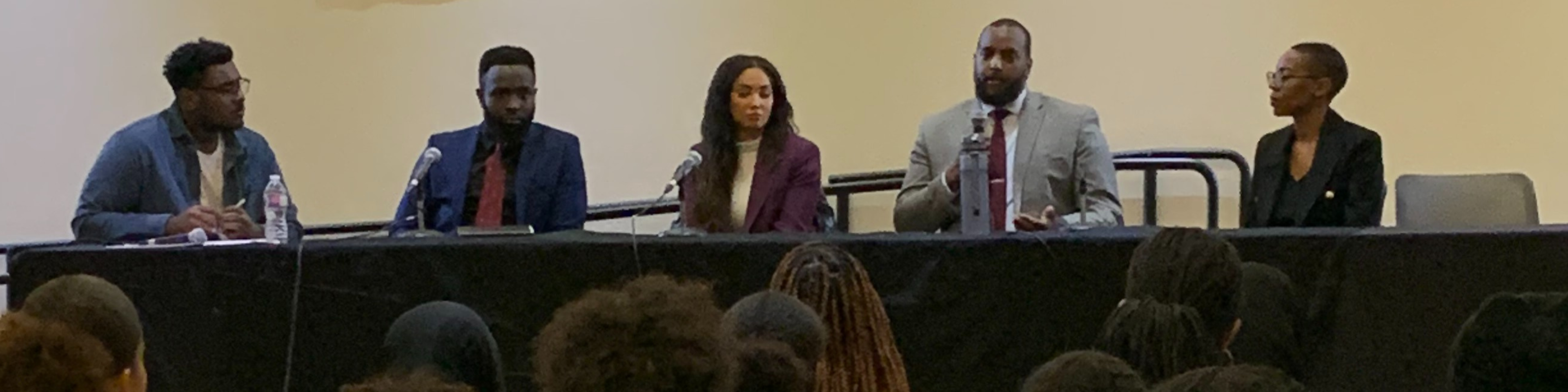 Photo of Black lawyers and Osgoode alumni during a panel discussion at the 2023 Raise the Black Bar conference for high school students.